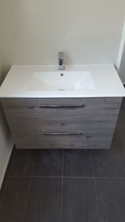 Wall-hung vanity fit-off after
